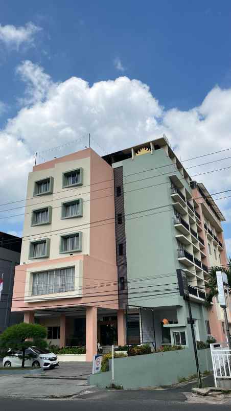 dijual hotel jalan wolter monginsidi