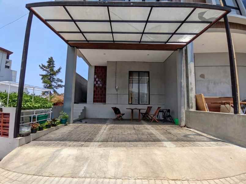 dijual rumah cluster villa tropis dago