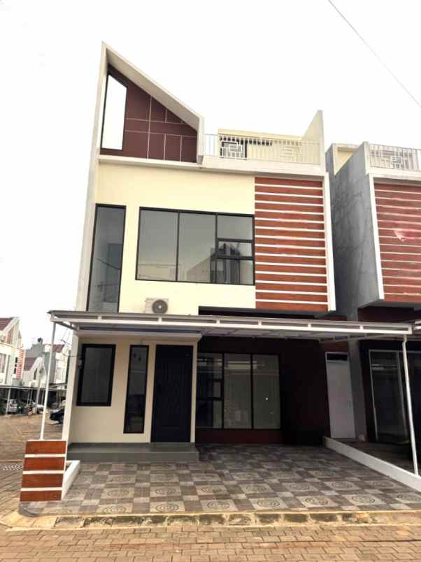 dijual rumah d bale cimuning townhouse