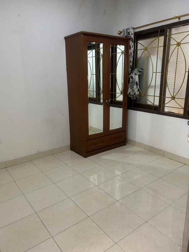 dijual rumah di raffles hills cibubur