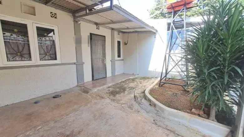 dijual rumah graha raya