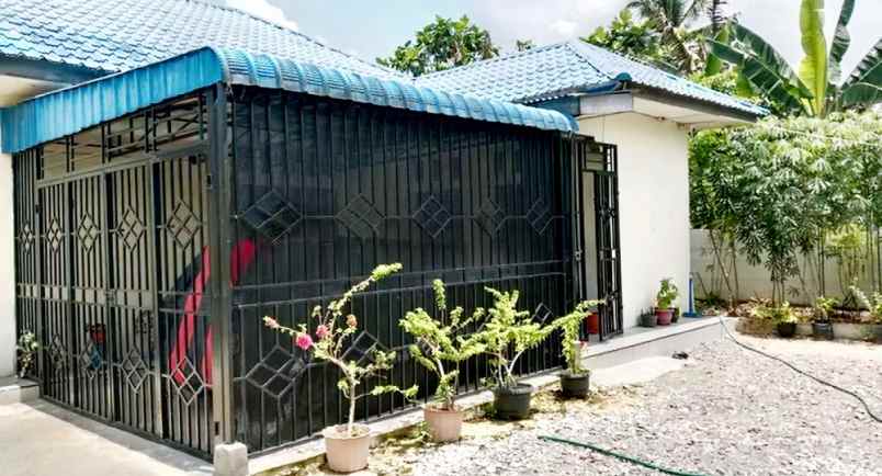 dijual rumah jl lintas pematang siantar