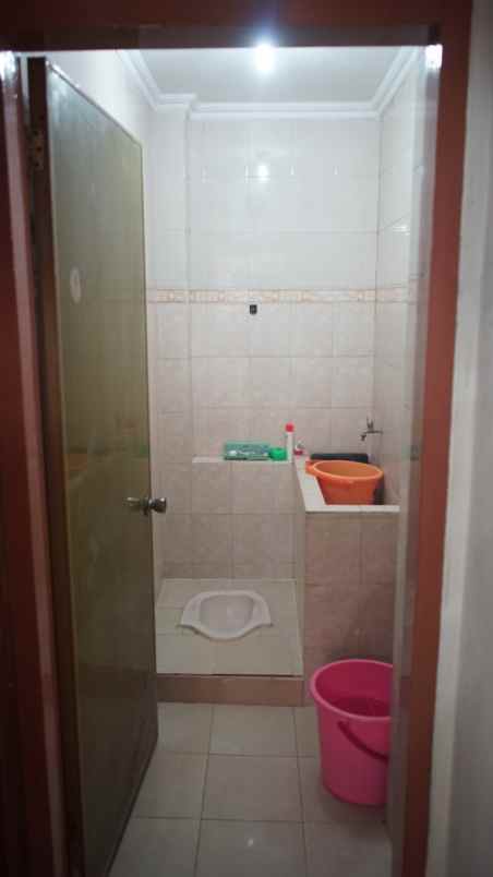 dijual rumah kayu putih