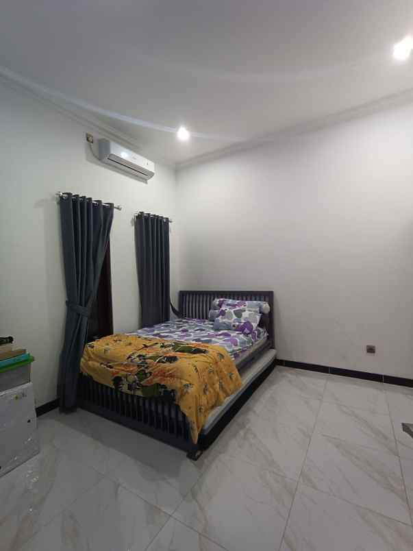 dijual rumah komplek deplu pondok aren