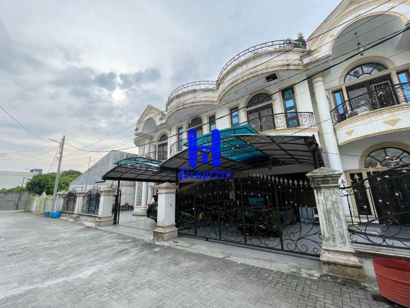 dijual rumah komplek taman polonia 5