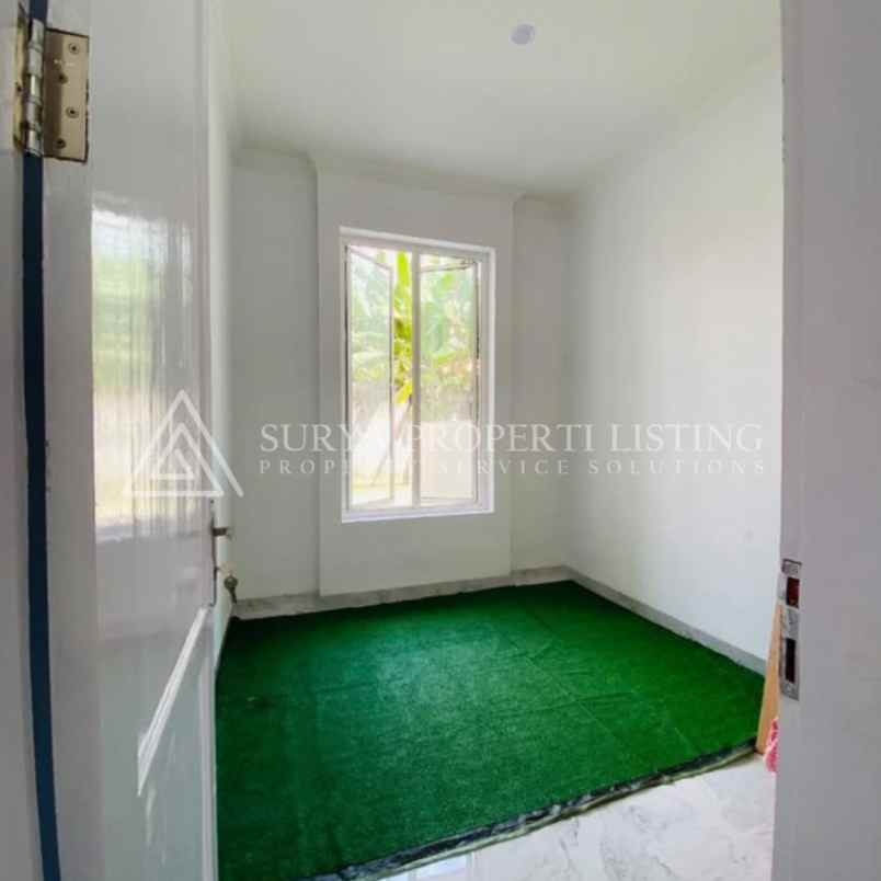 dijual rumah komplek tritura residence