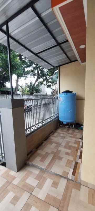 dijual rumah taman harapan baru
