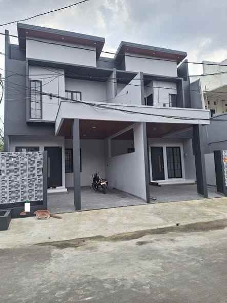 dijual rumah taman harapan baru kota