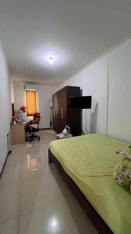 dijual rumah taman modern