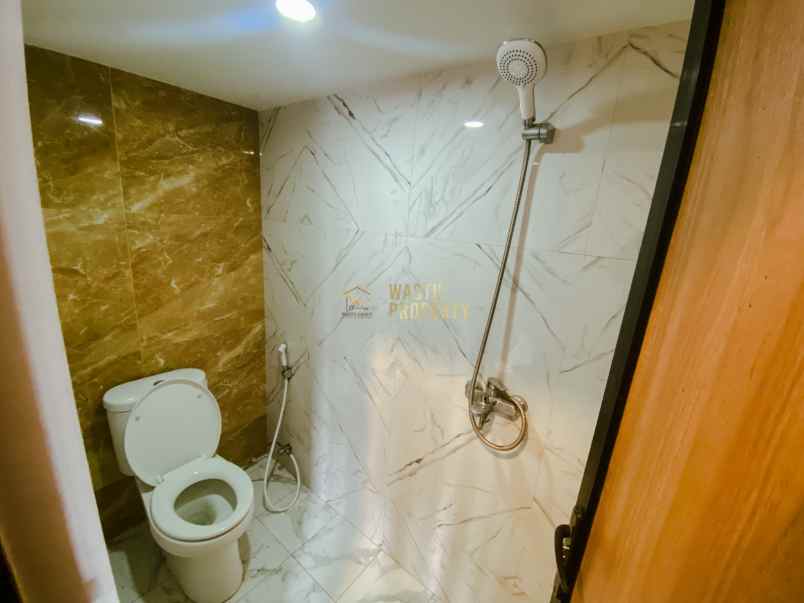 hunian premium 2 lantai di pinggir jalan raya tajem