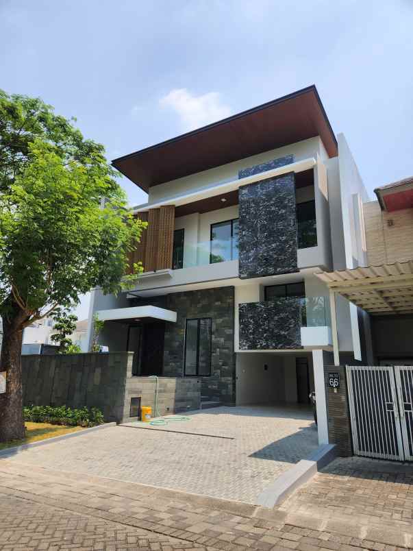 rumah baru woodland citraland surabaya barat
