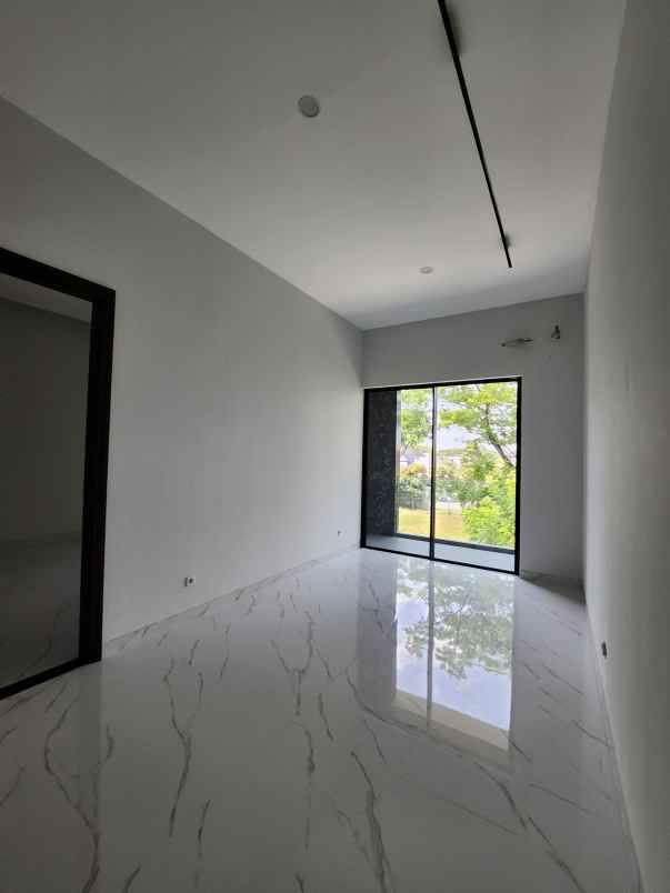 rumah baru woodland citraland surabaya barat