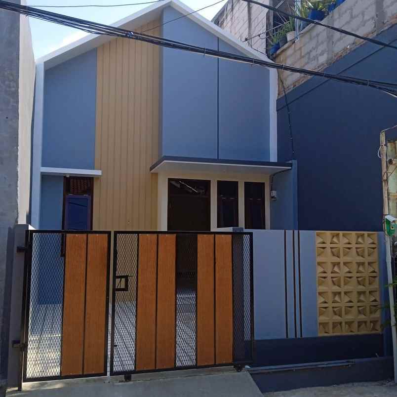 rumah biru harga murah di vmg 1 dekat harapan indah