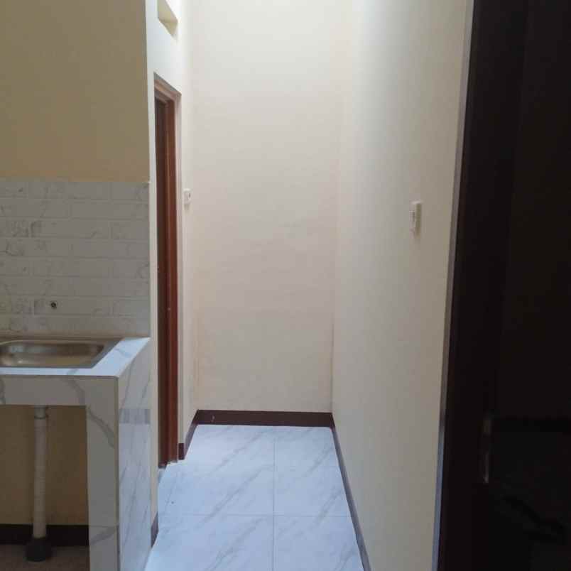 rumah biru harga murah di vmg 1 dekat harapan indah