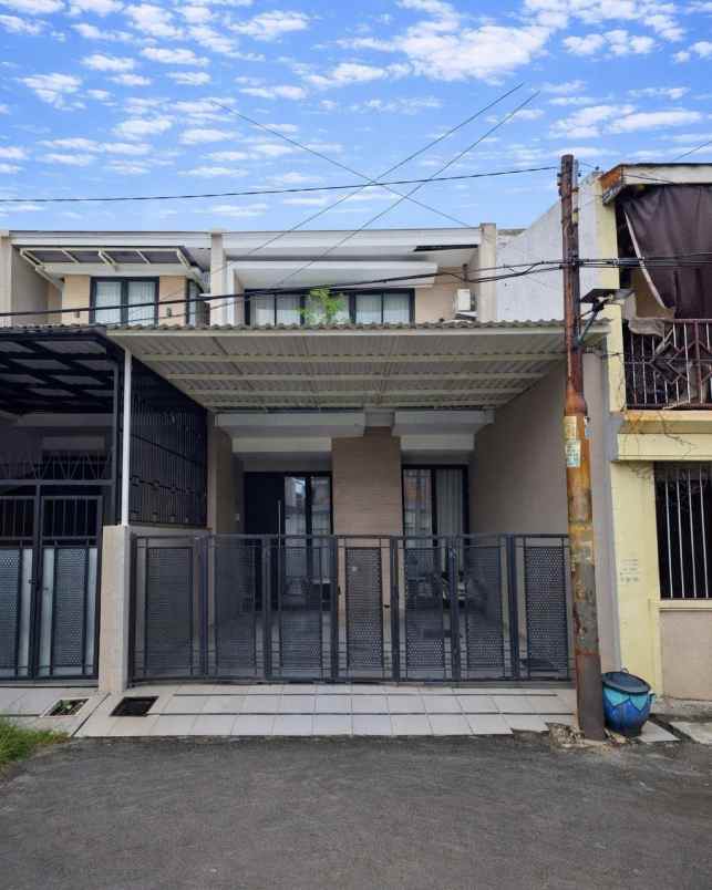 rumah lebak arum minimalis furnished carport 2