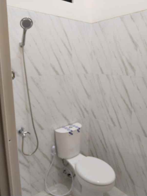 rumah taman wiguna siap huni strategis one gate sistem