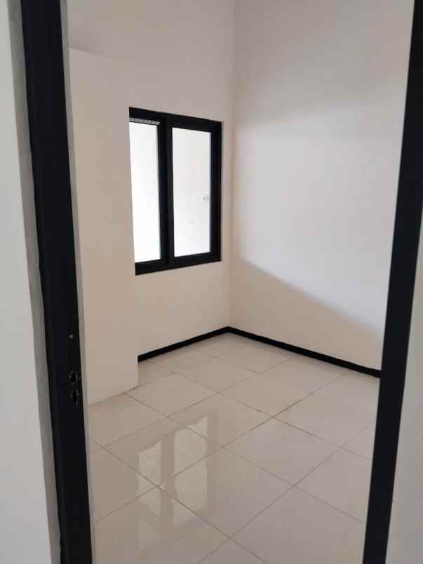 rumah taman wiguna siap huni strategis one gate sistem