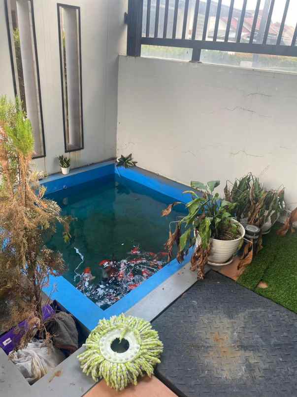 dijual rumah cluster derwati mas estate