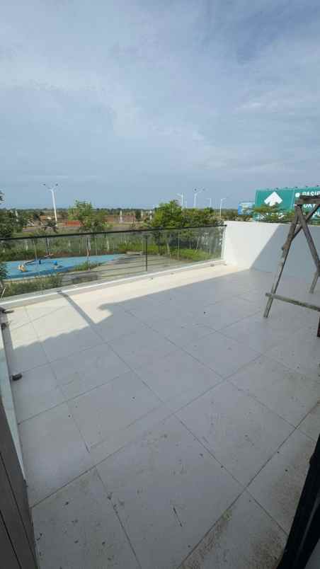 dijual rumah cluster kuningan village pik2