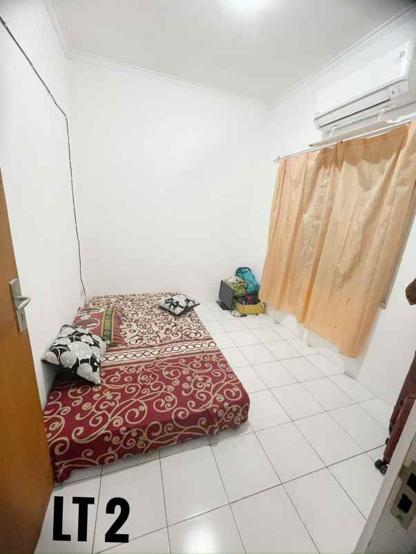 dijual rumah cluster mega regency