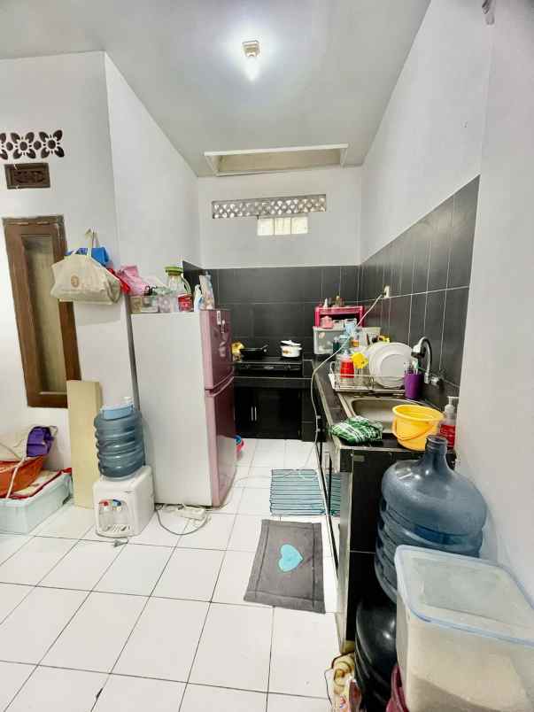 dijual rumah cluster mega regency