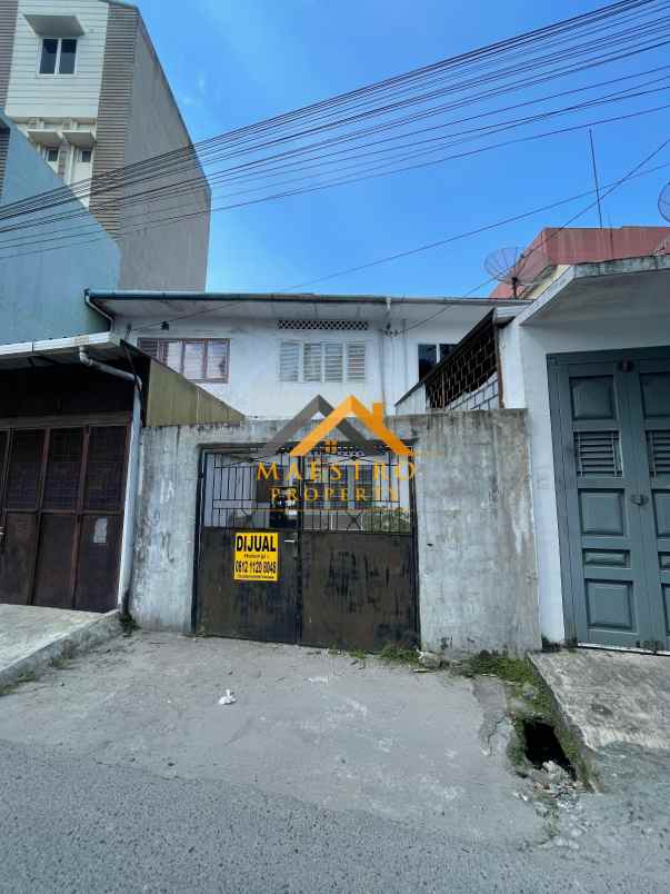 dijual rumah jalan harimau madong lubis