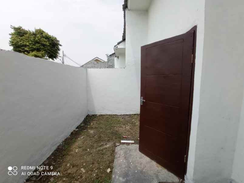dijual rumah jalan raya megu cisoka