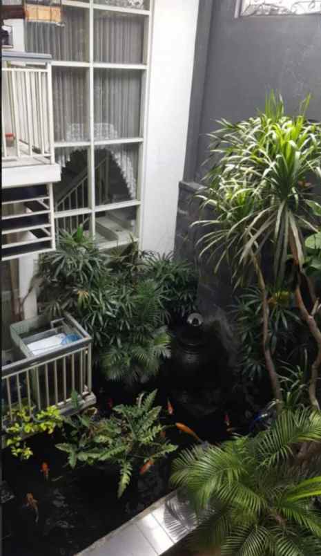 dijual rumah jalan raya taman indah