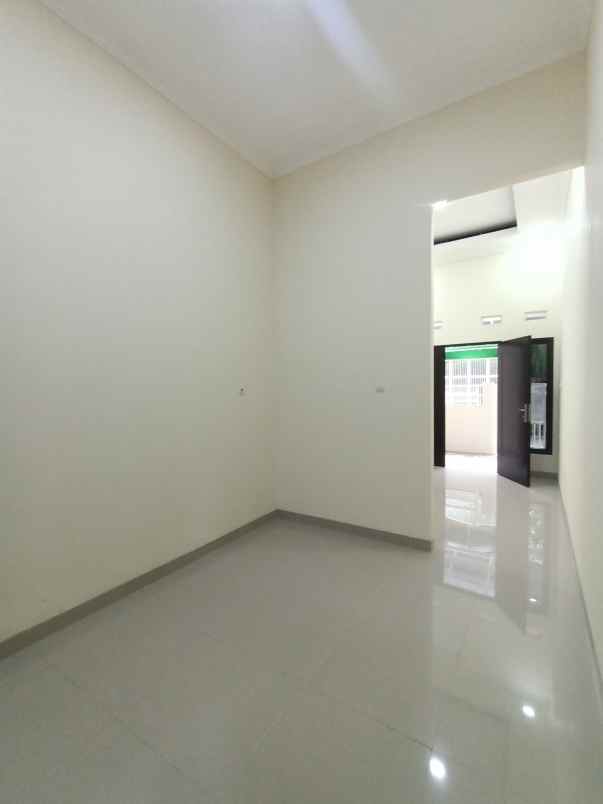 dijual rumah pesona anggrek harapan bekasi