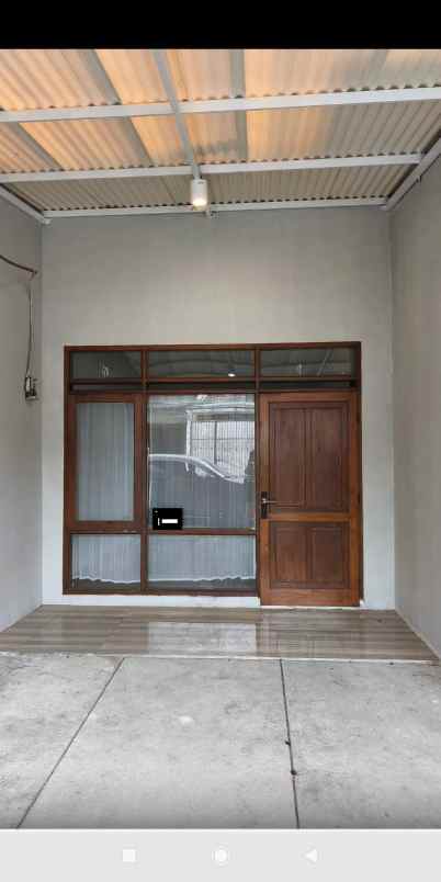 dijual rumah taman holis indah