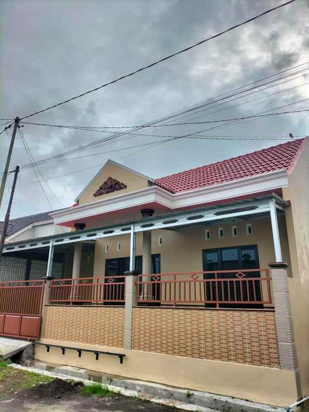 dijual rumah woltermonginsidi