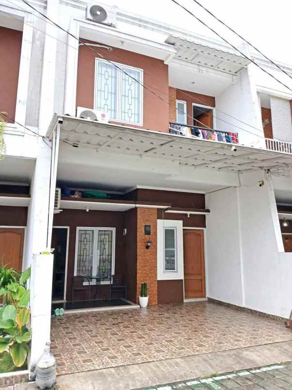 over kredit 85juta rumah 2 lantai di sukmajaya depok