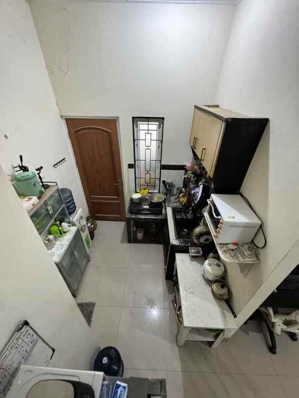 over kredit 85juta rumah 2 lantai di sukmajaya depok