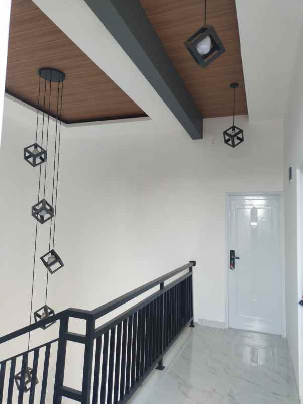 over kredit rumah 2 lantai dekat stasiun depok