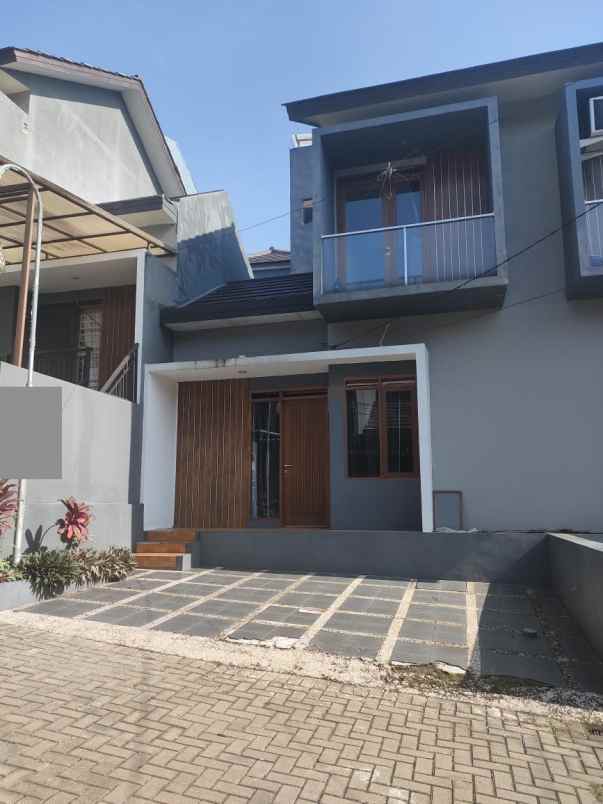 rumah cluster ubud village sariwangi