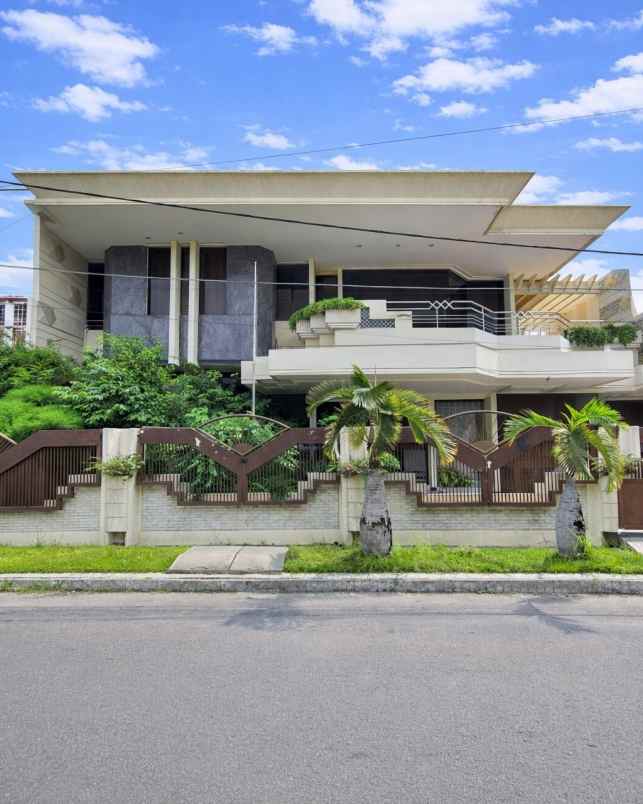 rumah dharmahusada indah minimalis