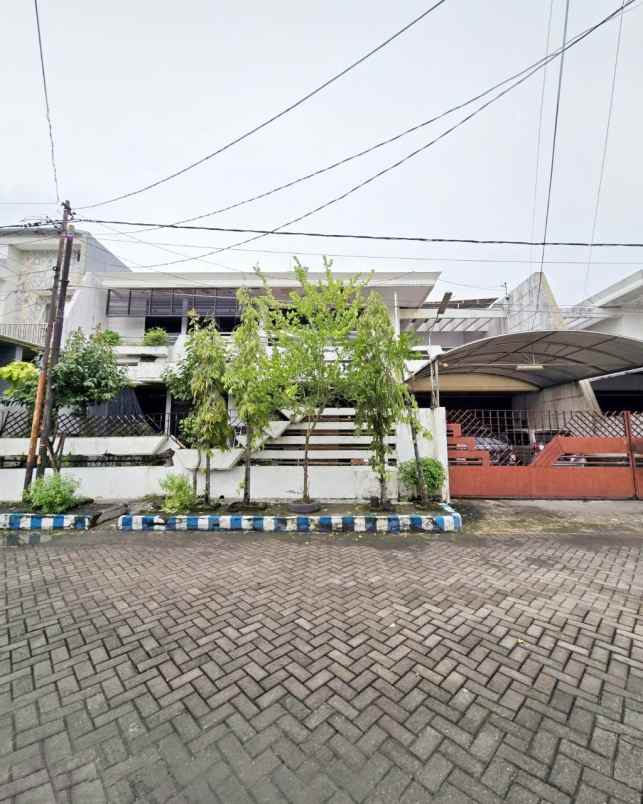 rumah dharmahusada indah strategis row 3 mobil