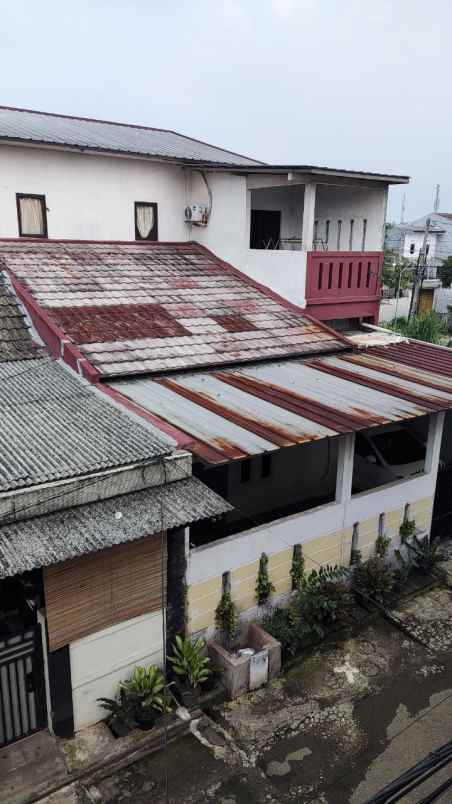 rumah jl binong kelapa dua