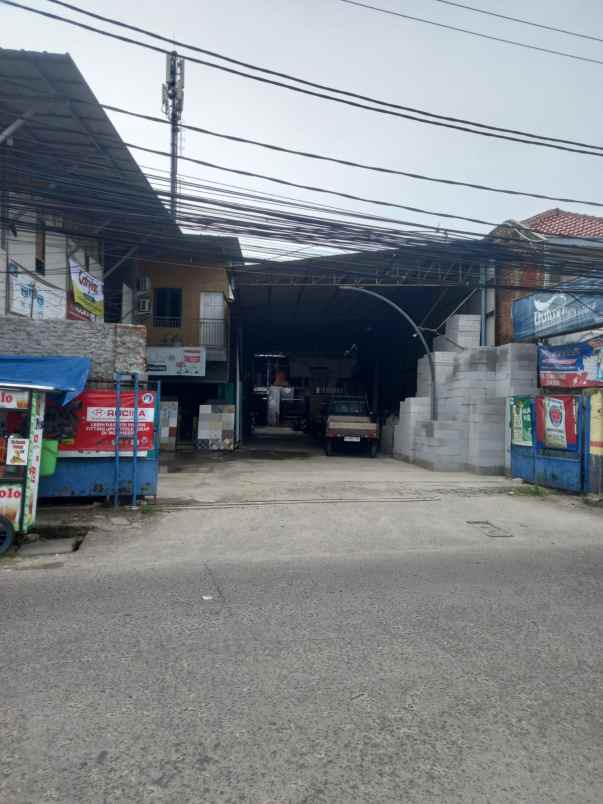 tanah ada bangunan gudangnya di tepi jalan raya