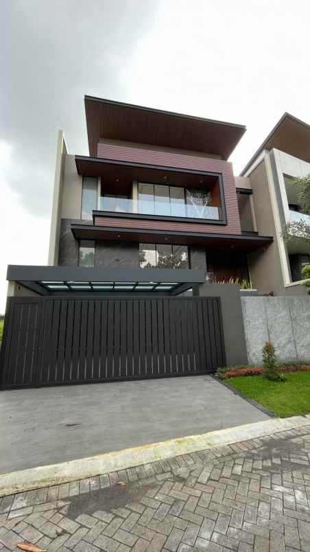 dijual rumah baru waterfront citraland surabaya barat