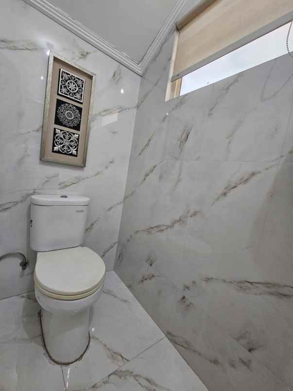 dijual rumah cluster alamanda jgc