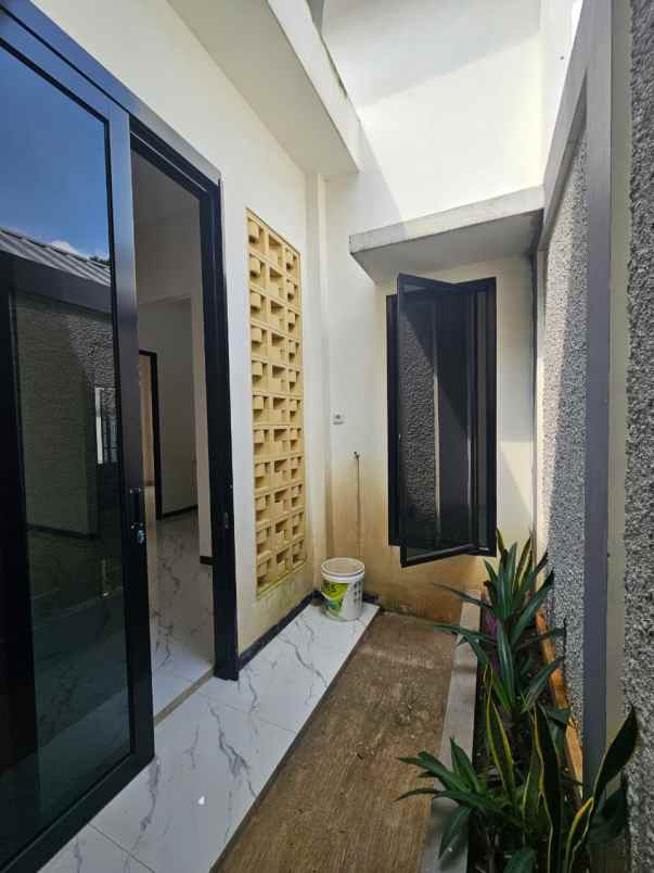 dijual rumah jalan raya sawangan bojongsari