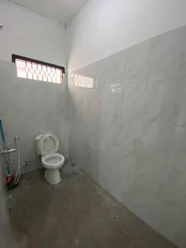 dijual rumah jl melati raya