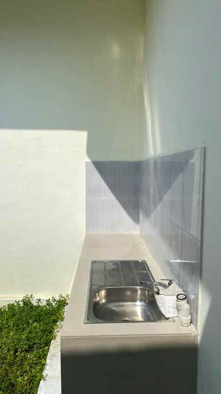 dijual rumah jl sam ratulangi