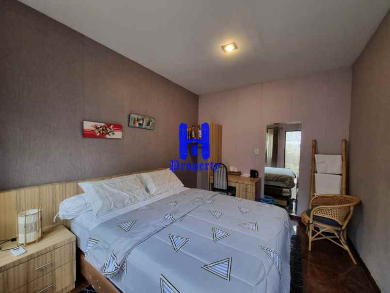 dijual rumah komplek graha helvetia