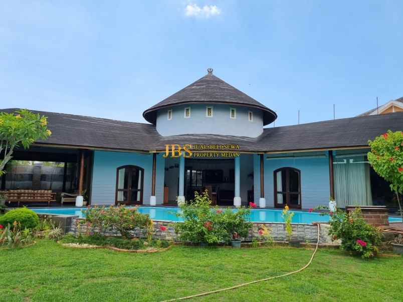 dijual rumah komplek graha helvetia