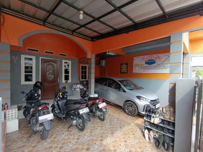 dijual rumah perumahan kalibaru permai