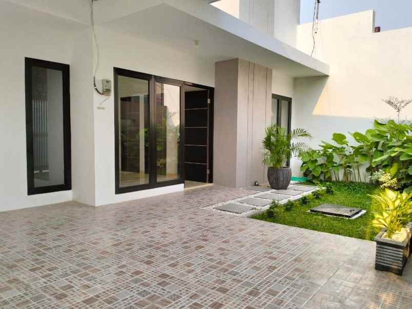 dijual rumah rumah wiguna timur