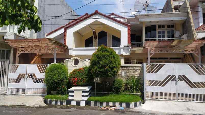 dijual rumah wisma permai barat