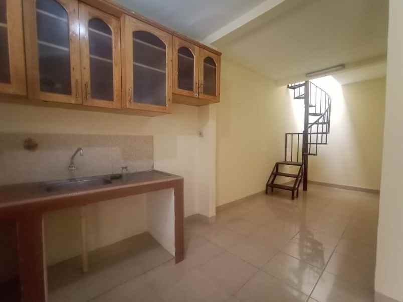 rumah coklat jawa jatibening indah